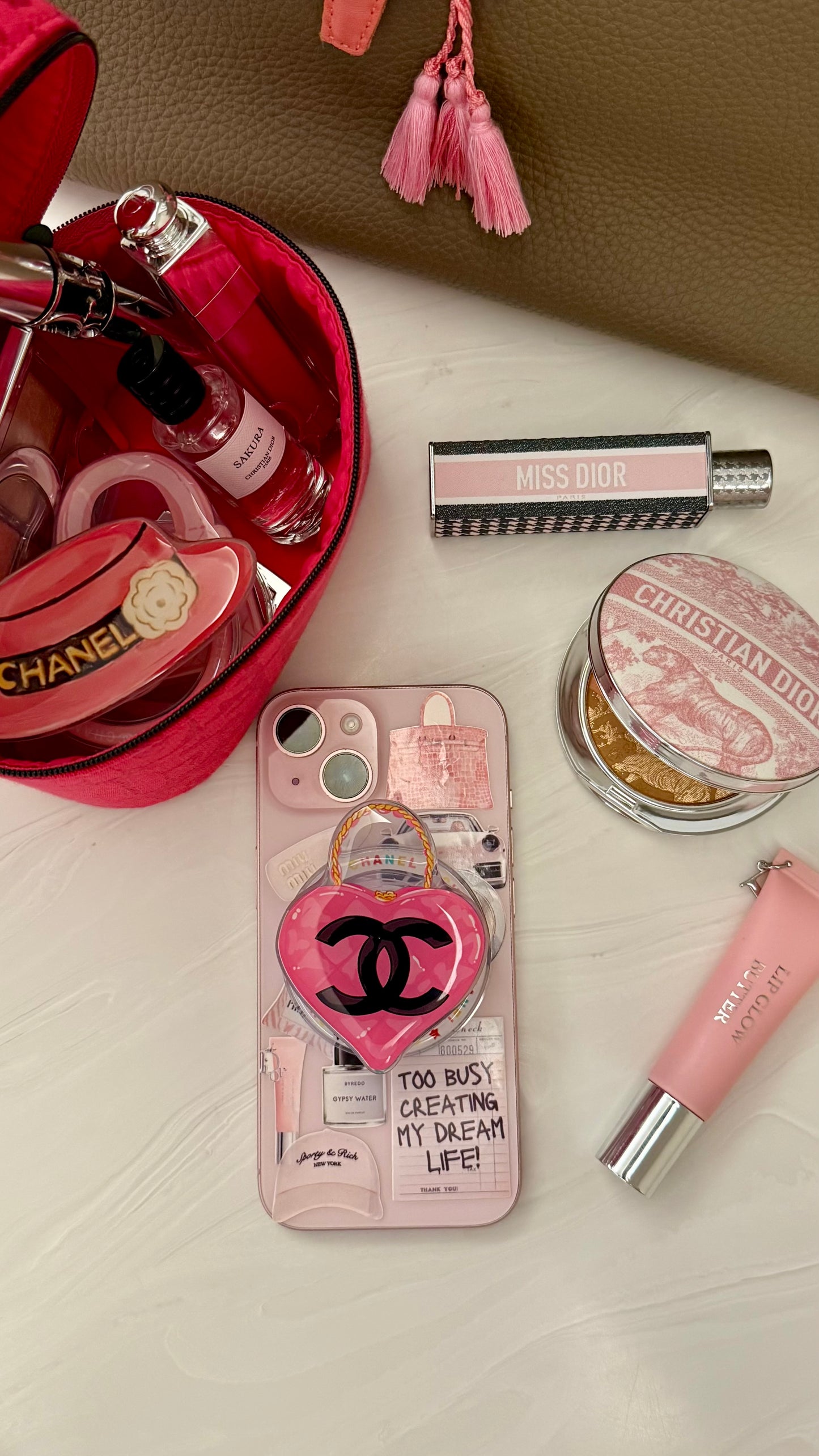 Pink heart Chanel phone grip